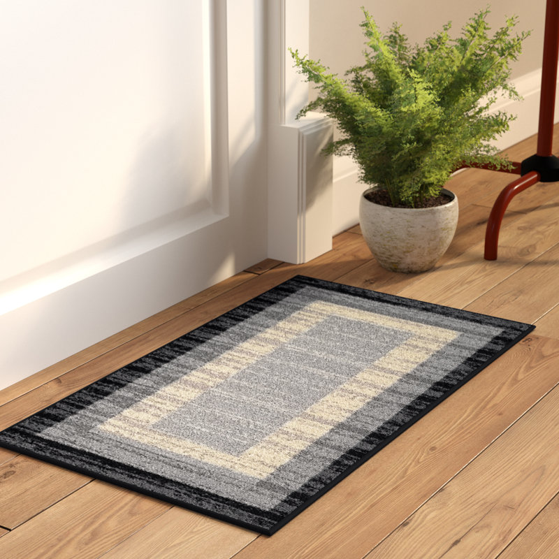 Ebern Designs Zlatkus Striped Rectangle Rubber Backed 31 in. x 18 in